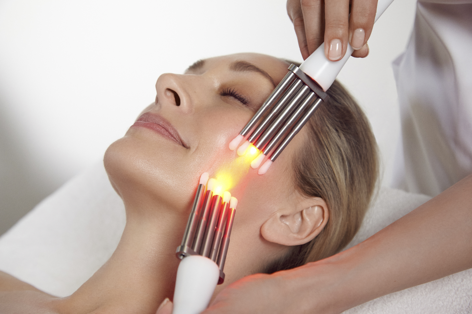 Woman receiving a CACI facial treatment